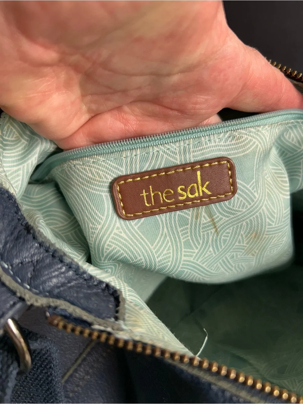 The‎ Sak Navy Leather Crossbody with Mint Interior